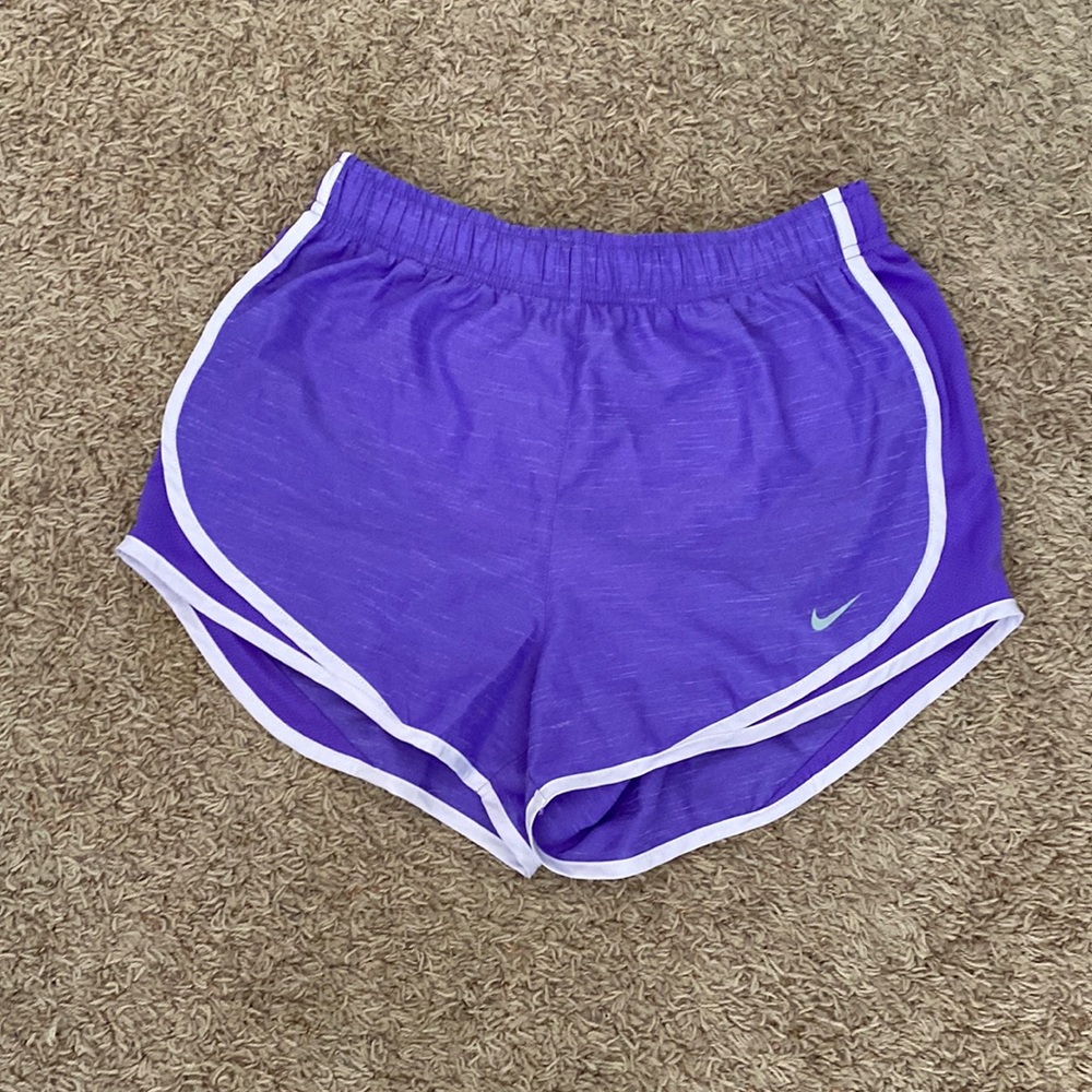 Purple Nike shorts